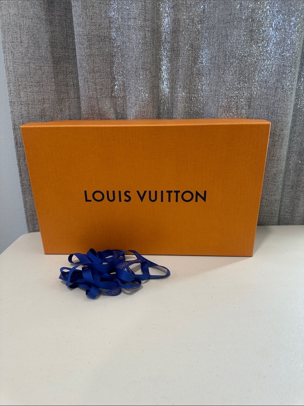 Authentic Louis Vuitton, empty men’s shoe box and ribbon